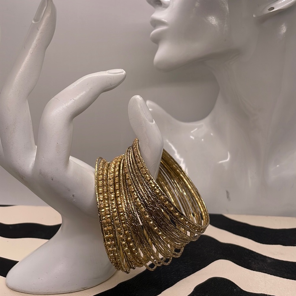 30 Beautiful Gold Tone Bangles.